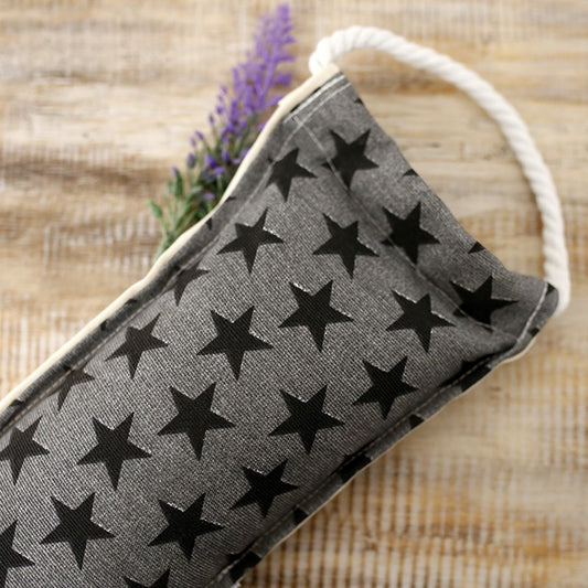 Saco térmico relleno de hueso de aceituna y flores de lavanda